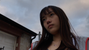 09: Girl looking away from the camera. Medium Close Up (Bordwell and Thompson, 189) & Low Angle (Block, 16-18).