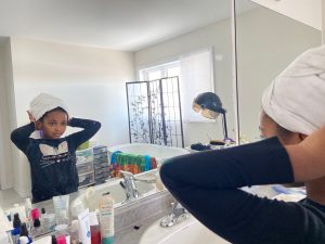 04: Isabella fixing her wrap towel in the mirror. One-Point Perspective (Block, 16-18)