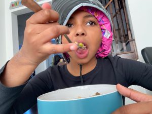 08: Isabella eating while deep conditioning her hair. Canted Level (Bordwell and Thompson, 188)