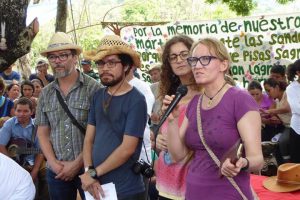 Amanda Grzyb speaking with the El Salvador team at the Sumpul Massacre commemoration in May 2019.