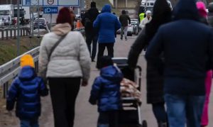 photo of a family walking together outside on a gloomy day