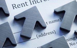 stock image of upward arrows on a rent application