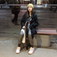 10: Girl waiting again for streetcar, thinking. Medium Long Shot (Bordwell and Thompson, 189) & Deep Space (Block, 16-18).