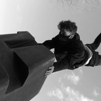 “When the Party’s Over” - 09: Man Doing Handstand on Structure. Low Angle (Bordwell and Thompson, 188-190), Medium Long Shot (Bordwell and Thompson, 189)