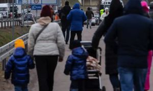 Dispatches from the Place of Imminence photo of a family walking together outside on a gloomy day