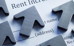Downtown London rent increases stock image of upward arrows on a rent application