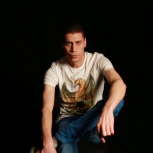 The Reverie Project Photo of a man staring into the camera